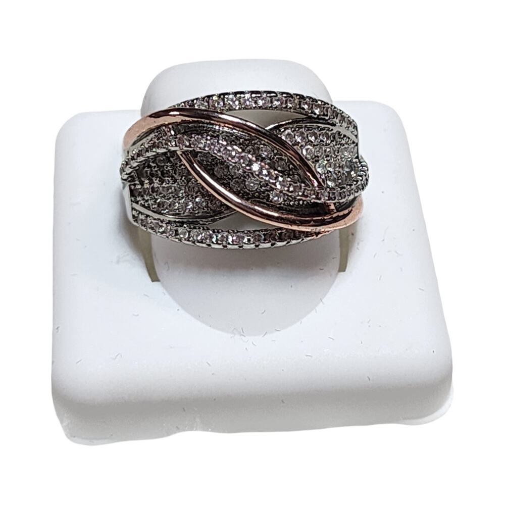 Interwoven two-tone synthetic Cubic Zirconia wide face ring. Size 8 Zinc Alloy